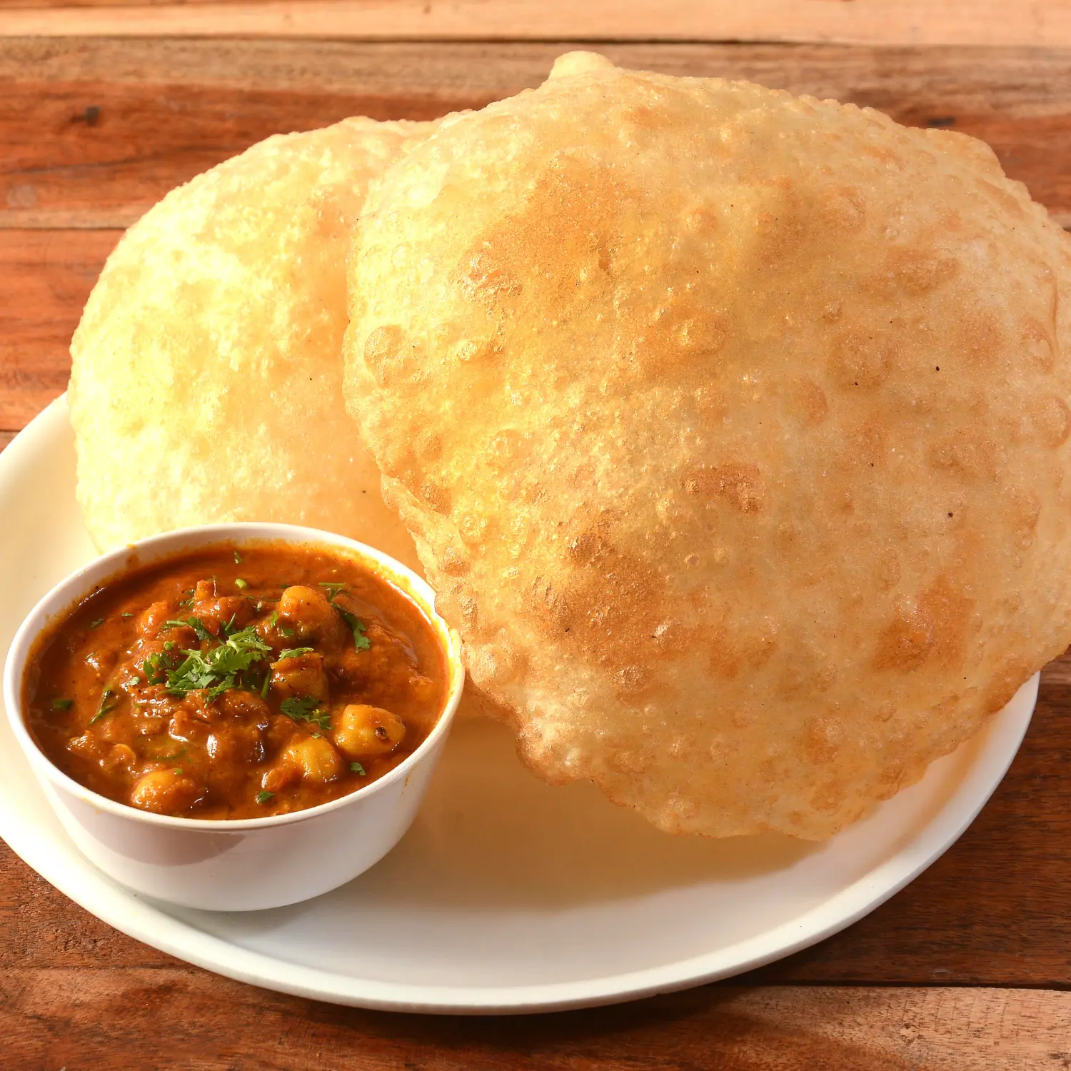 Different regions infuse their unique spices and cooking techniques, resulting in variations like Indian Chana Masala, Middle Eastern Hummus, and Spanish Garbanzos Guisados.